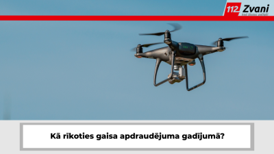 Drons gaisā. Uzraksts "Kā rīkoties gaisa apdraudējuma gadījumā?"