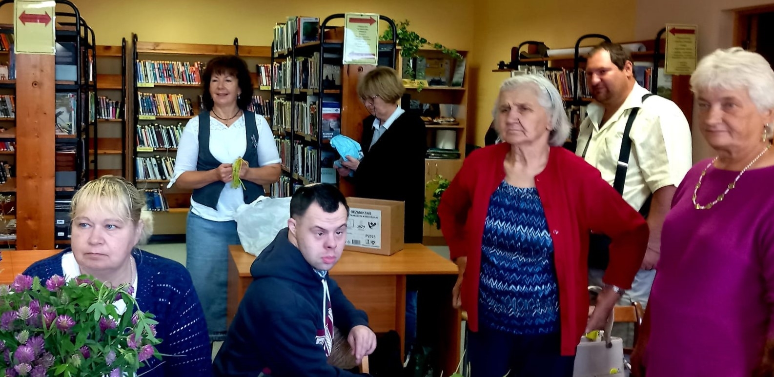 Dalībnieki bibliotēkā